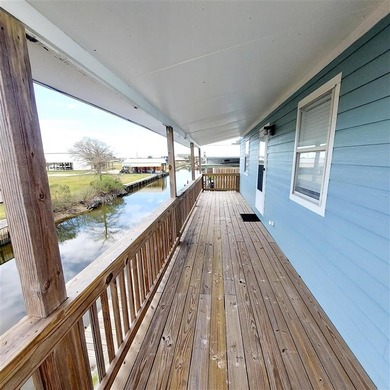 Waterfront property with canal frontage offering direct access - photo 13