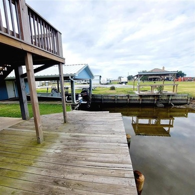 Waterfront property with canal frontage offering direct access - photo 22