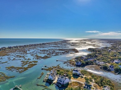 Wake up to sweeping marsh views, glowing sunsets, and the quiet