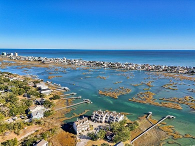 Wake up to sweeping marsh views, glowing sunsets, and the quiet