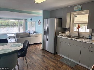 Want to live RIGHT on the water? Look no further. This community - photo 5