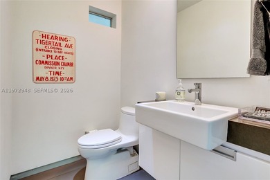 Located in Bay Heights, this 4-bedroom, 4.5-bath residence - photo 19