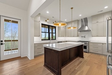 This exceptional new construction home seamlessly blends Old - photo 9