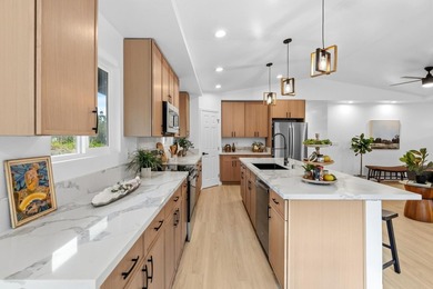 Welcome to 11-3290 Mokuna Street, a standout new listing in - photo 1