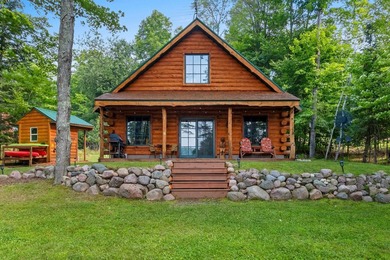 Experience true Northwoods living in this beautiful full log - photo 1