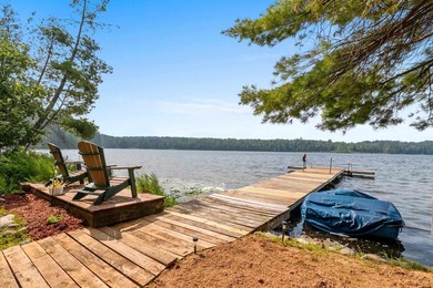 Experience true Northwoods living in this beautiful full log - photo 4