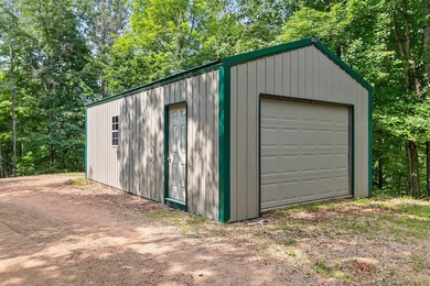 Experience true Northwoods living in this beautiful full log - photo 6