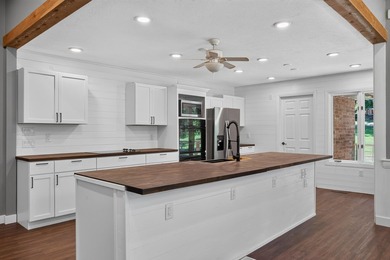Welcome to this spacious 6-bedroom, 3-bath home nestled on a - photo 3