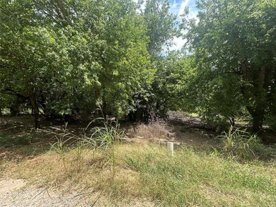 Welcome to this beautifully wooded, level lot. Nestled on a - photo 1
