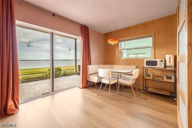 Discover serene riverfront living in this completely renovated - photo 9