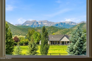 Set on 1.5 private acres with a Timpanogos view that's genuinely - photo 11