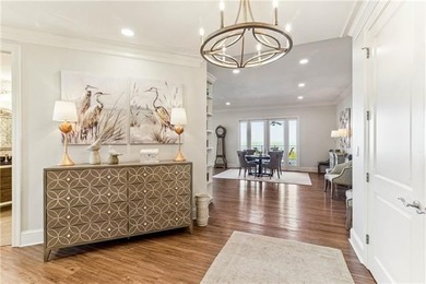 Luxury Lakefront Living in this meticulously maintained