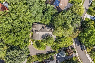 Perched atop a picturesque hill in Great Neck; Village of - photo 2