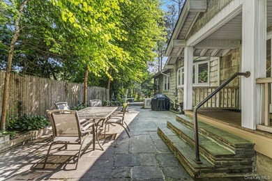 Perched atop a picturesque hill in Great Neck; Village of - photo 3