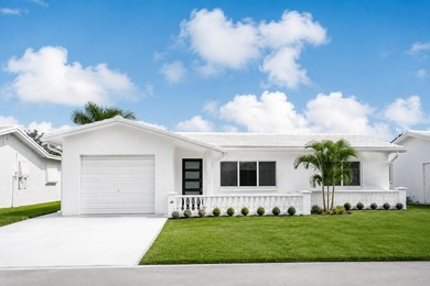WELCOME TO YOUR FULLY REMODELED SOUTH FLORIDA RETREAT IN THE - photo 1