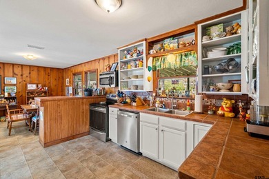 Sitting on 1.65 acres, inside the city limits, this incredibly - photo 14
