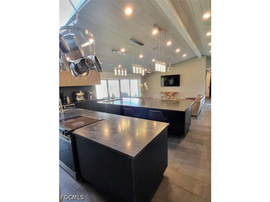 Experience refined Naples living in this beautifully updated - photo 3