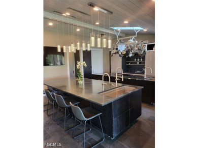 Experience refined Naples living in this beautifully updated - photo 4
