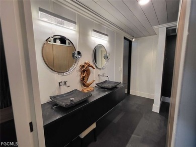 Experience refined Naples living in this beautifully updated - photo 7