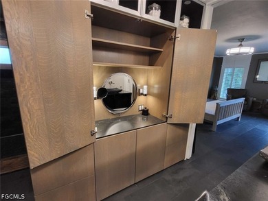 Experience refined Naples living in this beautifully updated - photo 8