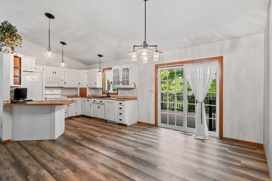 Situated on beautiful McCauslin Brook Golf Course, this well - photo 6
