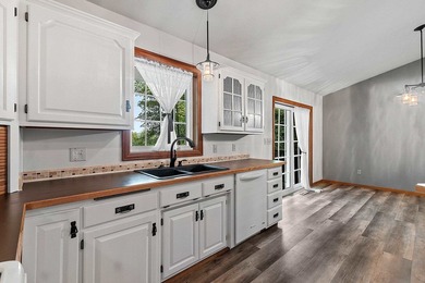 Situated on beautiful McCauslin Brook Golf Course, this well - photo 10