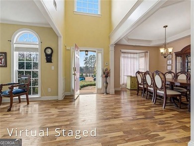 Welcome to this stunning 5-bedroom, 4-bath home located in the - photo 3