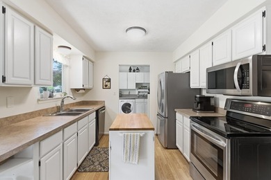 Just outside downtown Howell, this lovingly curated ranch is a - photo 5