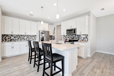 Step into this stunning 3-bedroom, 2.5-bath End-unit townhome - photo 9