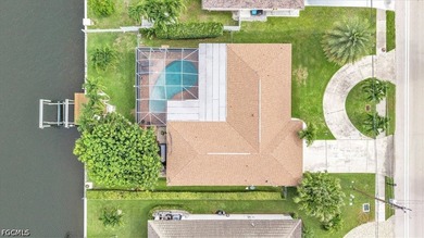 SAILBOAT ACCESS POOL HOME LOCATED ON PELICAN BLVD. Discover - photo 1