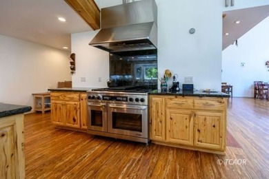 Experience the rare opportunity to own a custom riverfront - photo 15