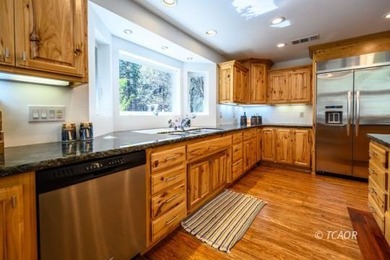 Experience the rare opportunity to own a custom riverfront - photo 17