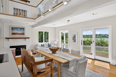 Set on a rare peninsula overlooking 27 acres of protected - photo 18