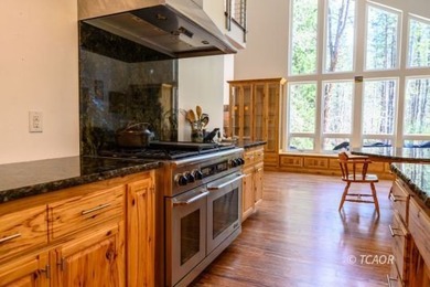 Experience the rare opportunity to own a custom riverfront - photo 19