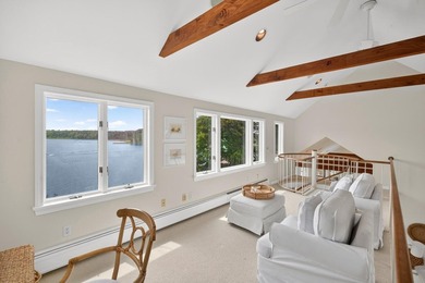 Set on a rare peninsula overlooking 27 acres of protected - photo 23