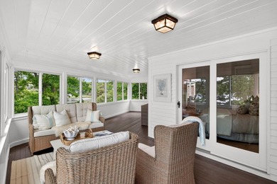 Set on a rare peninsula overlooking 27 acres of protected - photo 26