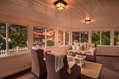 Set on a rare peninsula overlooking 27 acres of protected - photo 27