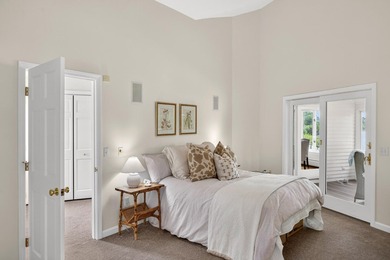 Set on a rare peninsula overlooking 27 acres of protected - photo 33