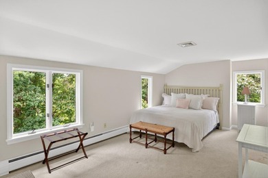 Set on a rare peninsula overlooking 27 acres of protected - photo 35