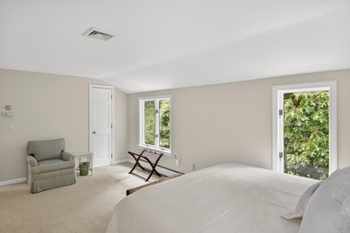 Set on a rare peninsula overlooking 27 acres of protected - photo 36