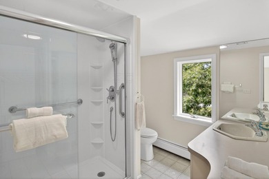 Set on a rare peninsula overlooking 27 acres of protected - photo 37