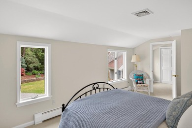 Set on a rare peninsula overlooking 27 acres of protected - photo 39