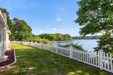 Set on a rare peninsula overlooking 27 acres of protected - photo 41