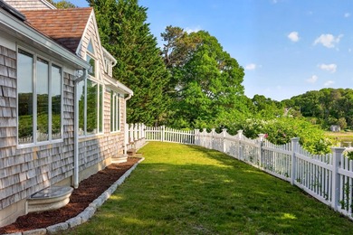 Set on a rare peninsula overlooking 27 acres of protected - photo 42