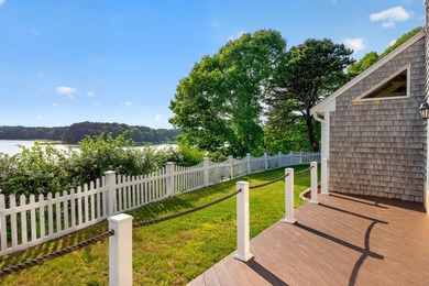 Set on a rare peninsula overlooking 27 acres of protected - photo 45