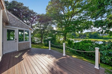 Set on a rare peninsula overlooking 27 acres of protected - photo 47