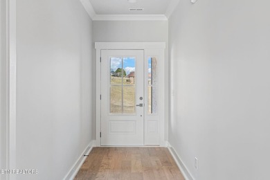 NEW CONSTRUCTION - MAIN LEVEL LIVING WITH BONUS UP! Located in - photo 4