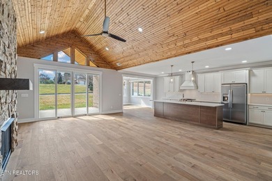 NEW CONSTRUCTION - MAIN LEVEL LIVING WITH BONUS UP! Located in - photo 6