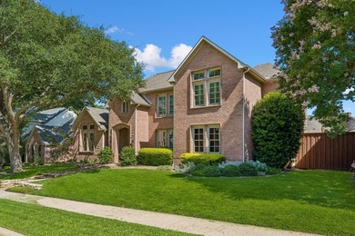 Welcome to this stunning two-story brick home nestled in the - photo 2