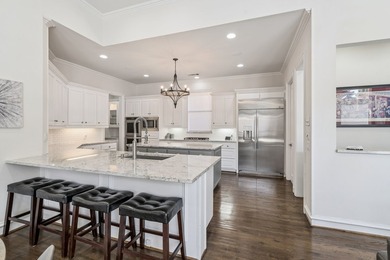 Welcome to this stunning two-story brick home nestled in the - photo 10